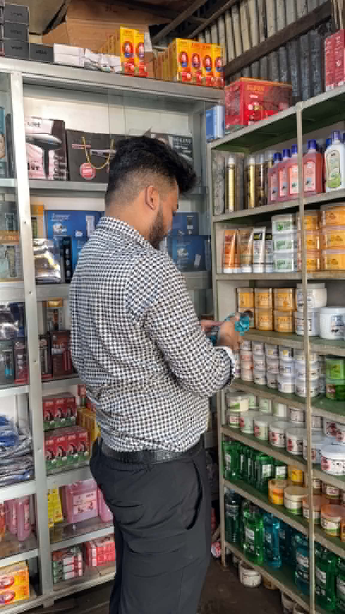 The director of KS Group reviewing products in a wholesale shop
